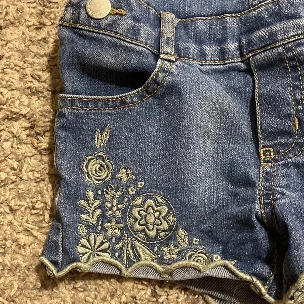 Genuine Kids from OshKosh denim overall shorts with floral design | size: 2T - Picture 2 of 6